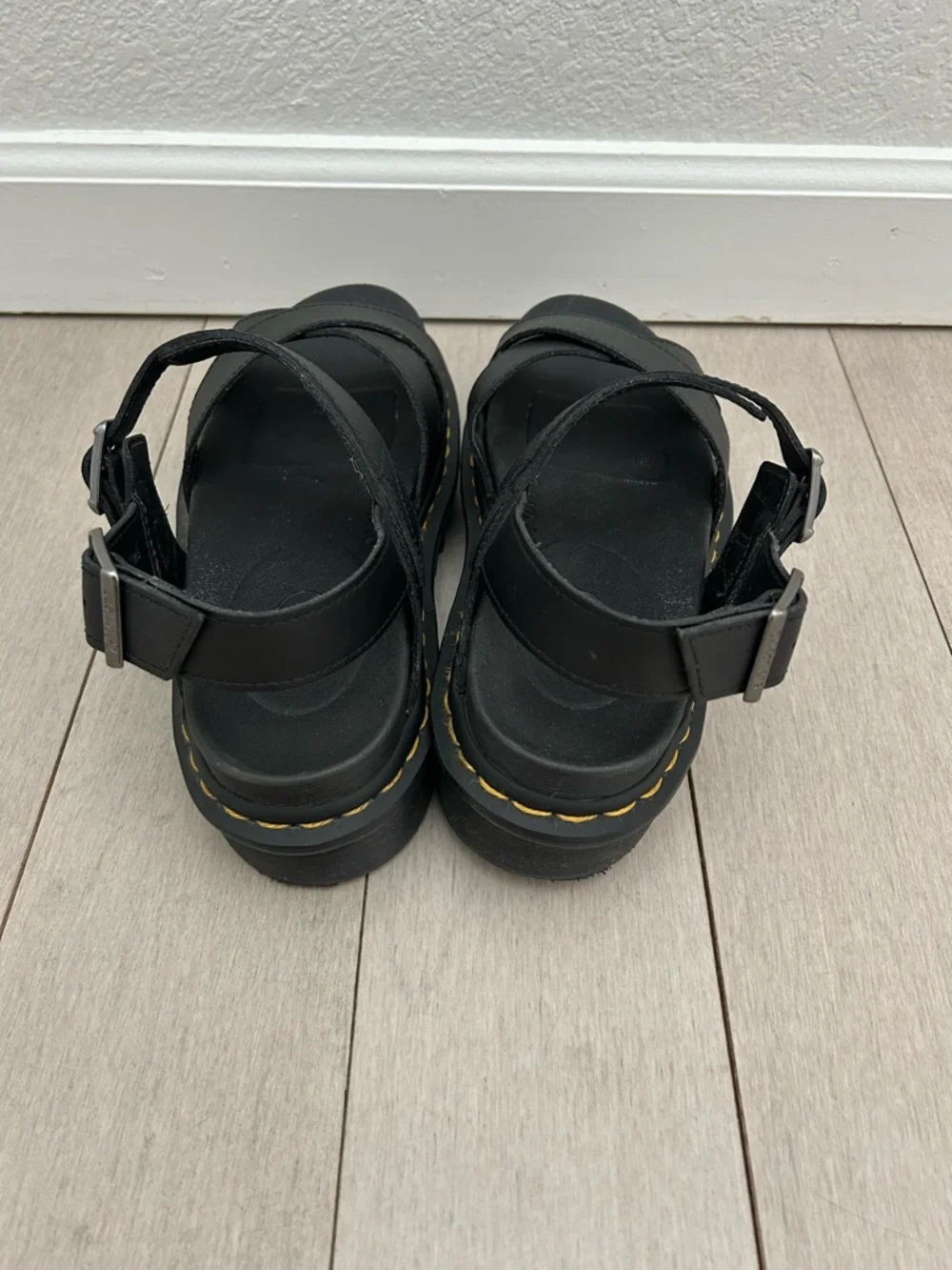 Dr. Martens Black Platform Crisscross Sandals with Yellow Stitching